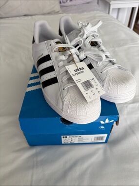 adidas mens Superstar Sneakers White with Black Stripes